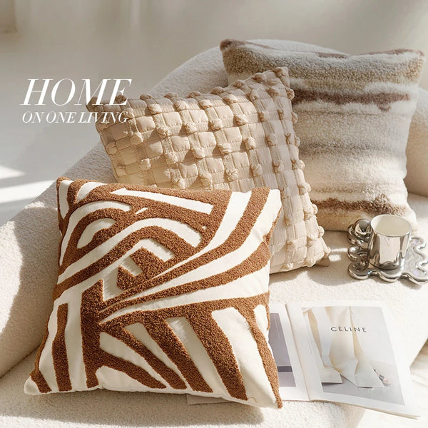 Detail shot of the woven brown and cream surface texture of the decorative throw pillow cover
