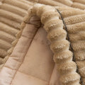 Charcoal Calm flannel sofa cover shown from above highlighting anti-slip underside and secure placement on cushion