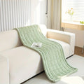 Pet-friendly plush sofa cover protecting a modern couch in a warm family living space